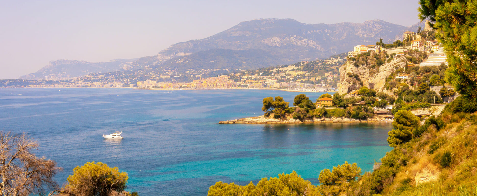 Gulf of Balzi Rossi in Ventimiglia in Italian Riviera with Menton and Cap Martin on the background Golfo dei Balzi Rossi con Mentone sullo sfondo